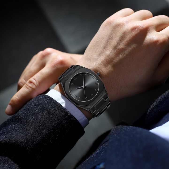 Arabic Aura Watch side angle showing stainless steel case thickness and crown details
