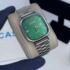 Casio Classic Quartz Watch featuring green gradient dial and silver metal bracelet