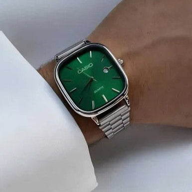 Casio green dial quartz watch worn on wrist showing elegant square case design